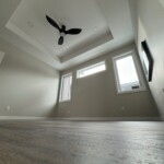 Beautiful ceilings, lighting, and fans by the custom RTM home team of Pioneer Homes.